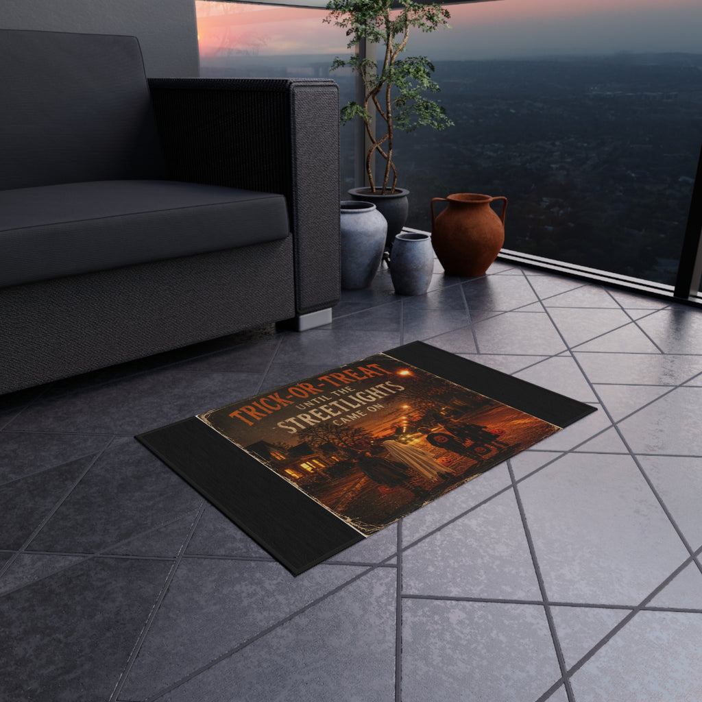 Outdoor Rug — "Trick-or-Treat Until the Streetlights Came On" Halloween Welcome Mat