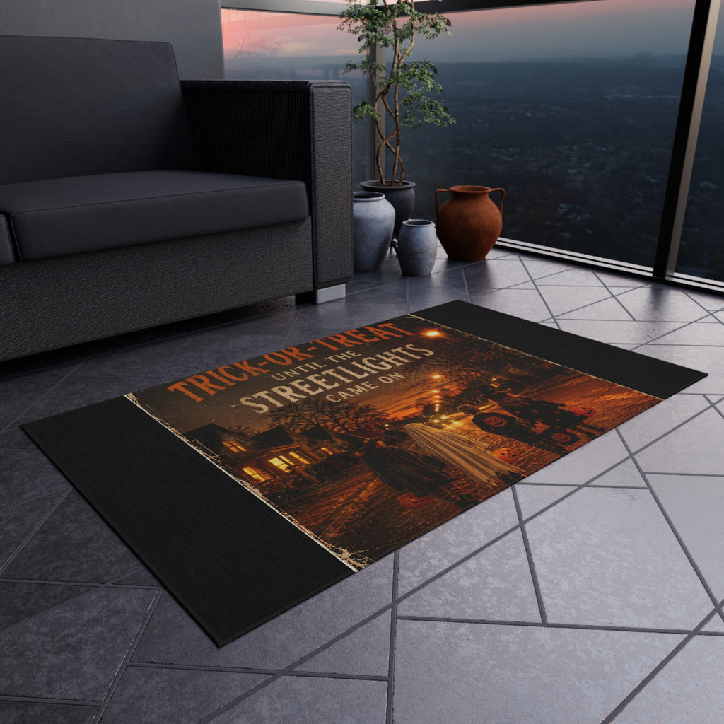Outdoor Rug — "Trick-or-Treat Until the Streetlights Came On" Halloween Welcome Mat